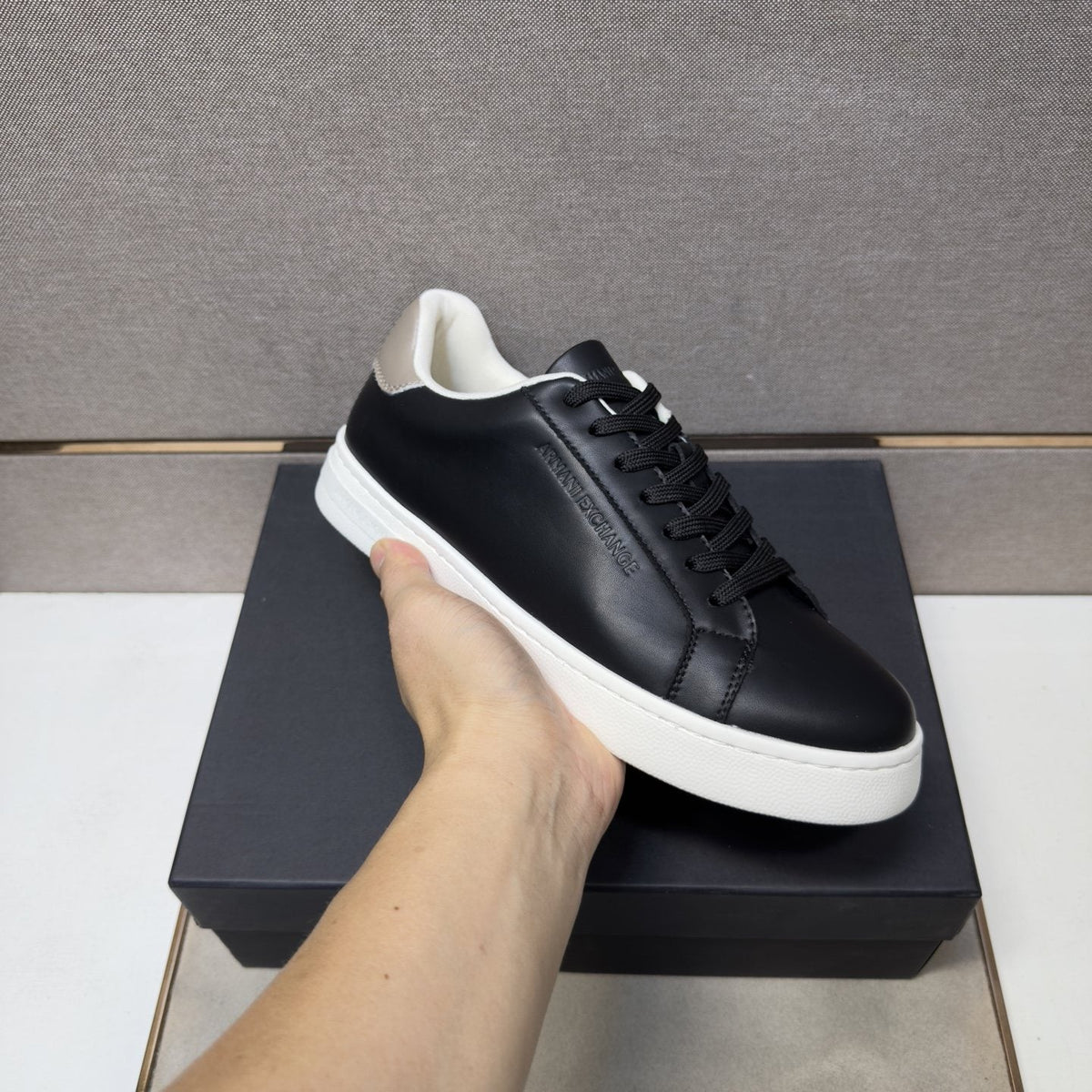 Armani Exchange Contrast Heel Low-Top Sneakers — model